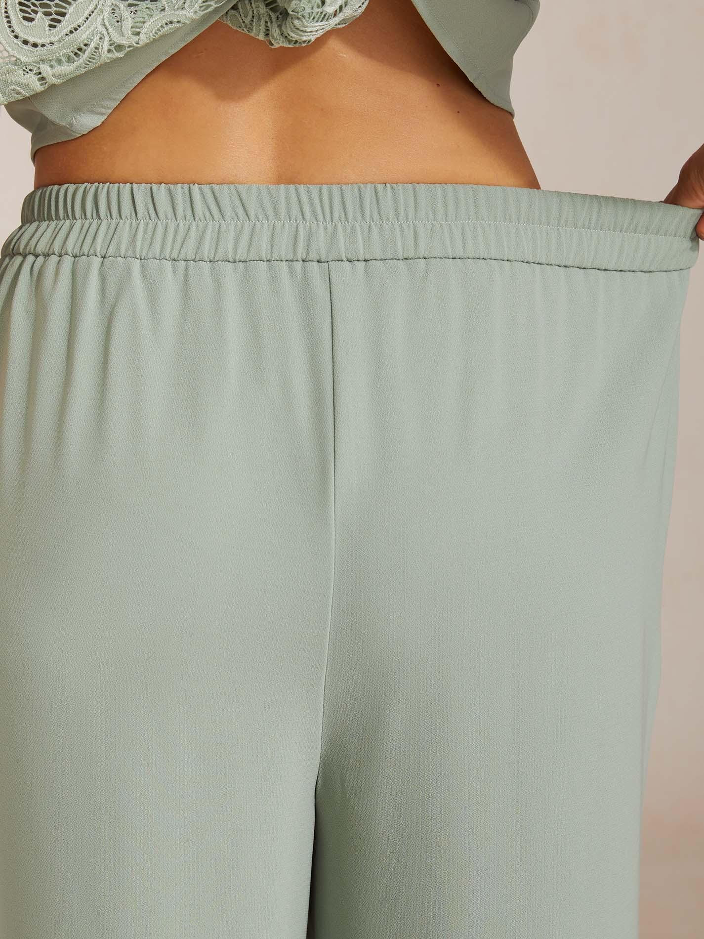 Mid-rise elastische taille wijde broek met zakken