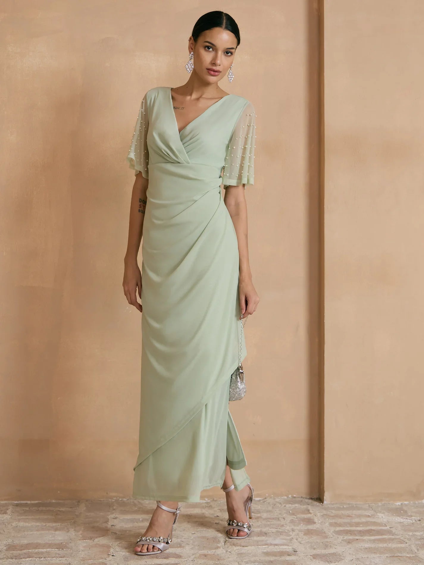 Elegante Galajurk met Versierde Fladdermouwen