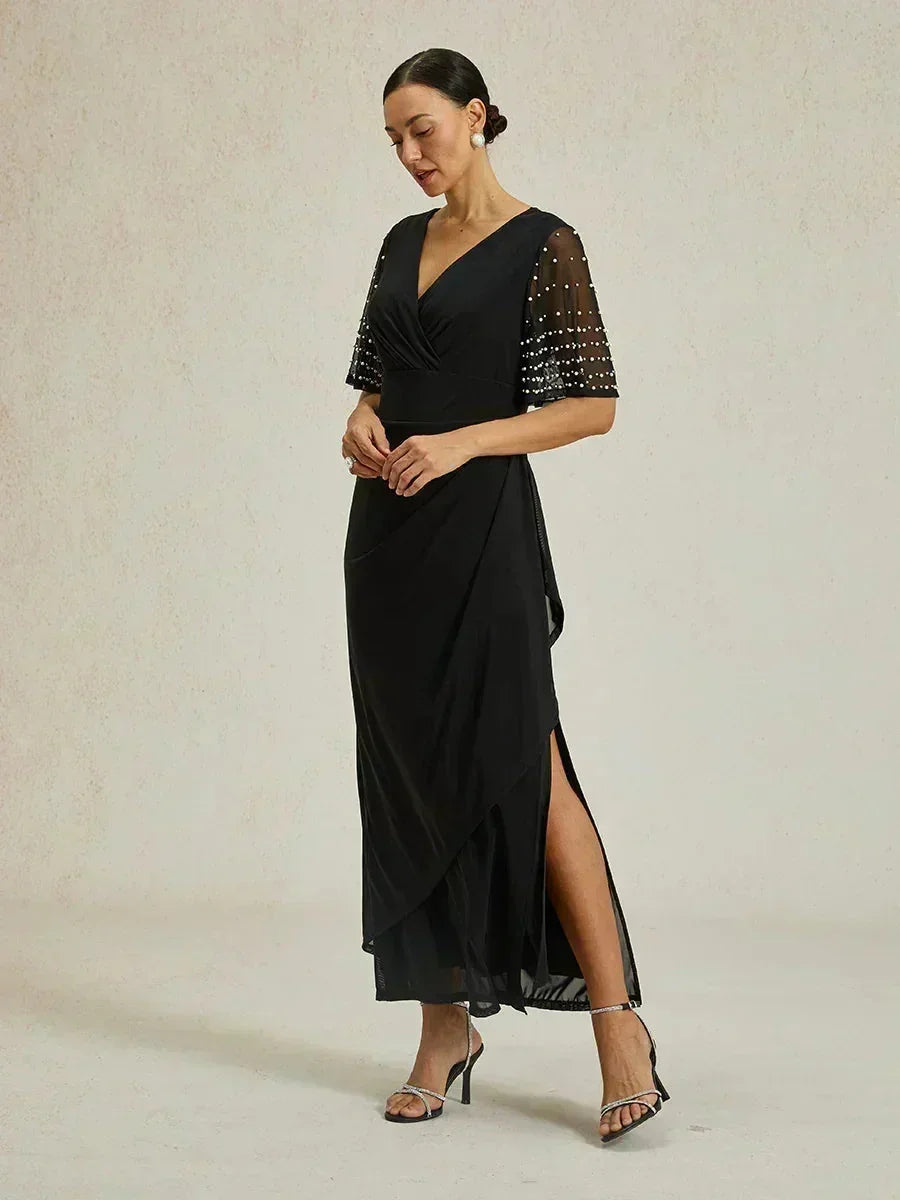 Elegante Galajurk met Versierde Fladdermouwen