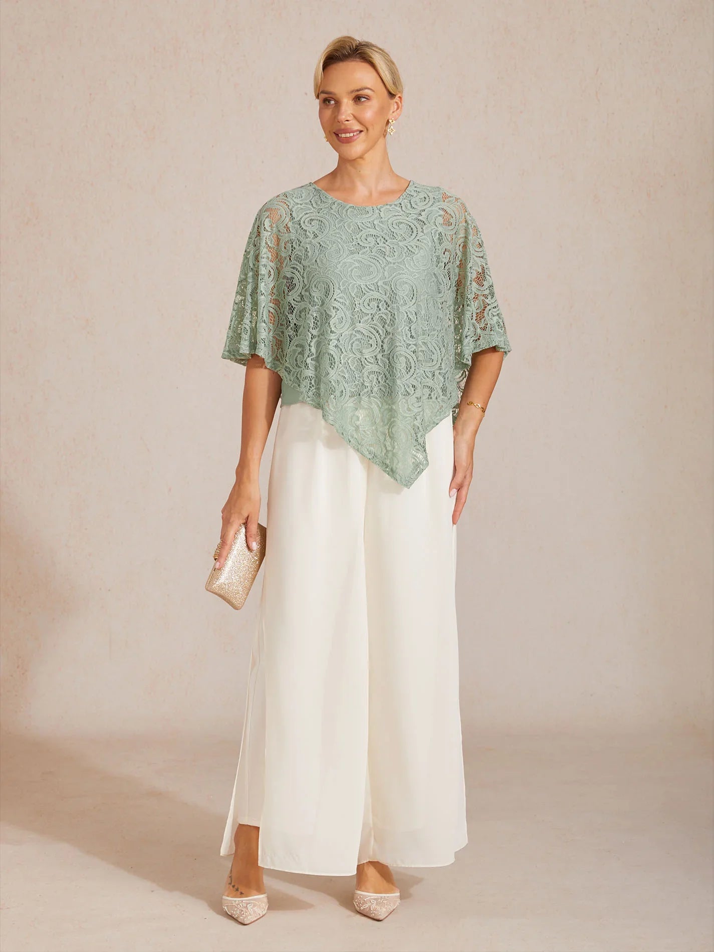Elegante top met vleermuismouwen van kant