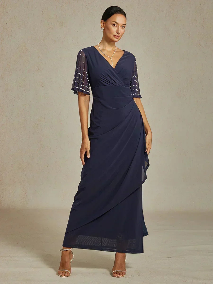 Elegante Formele Galajurk met Versierde Fladdermouwen