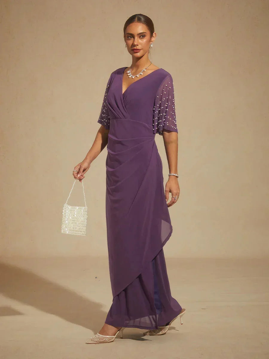 Elegante Formele Galajurk met Versierde Fladdermouwen