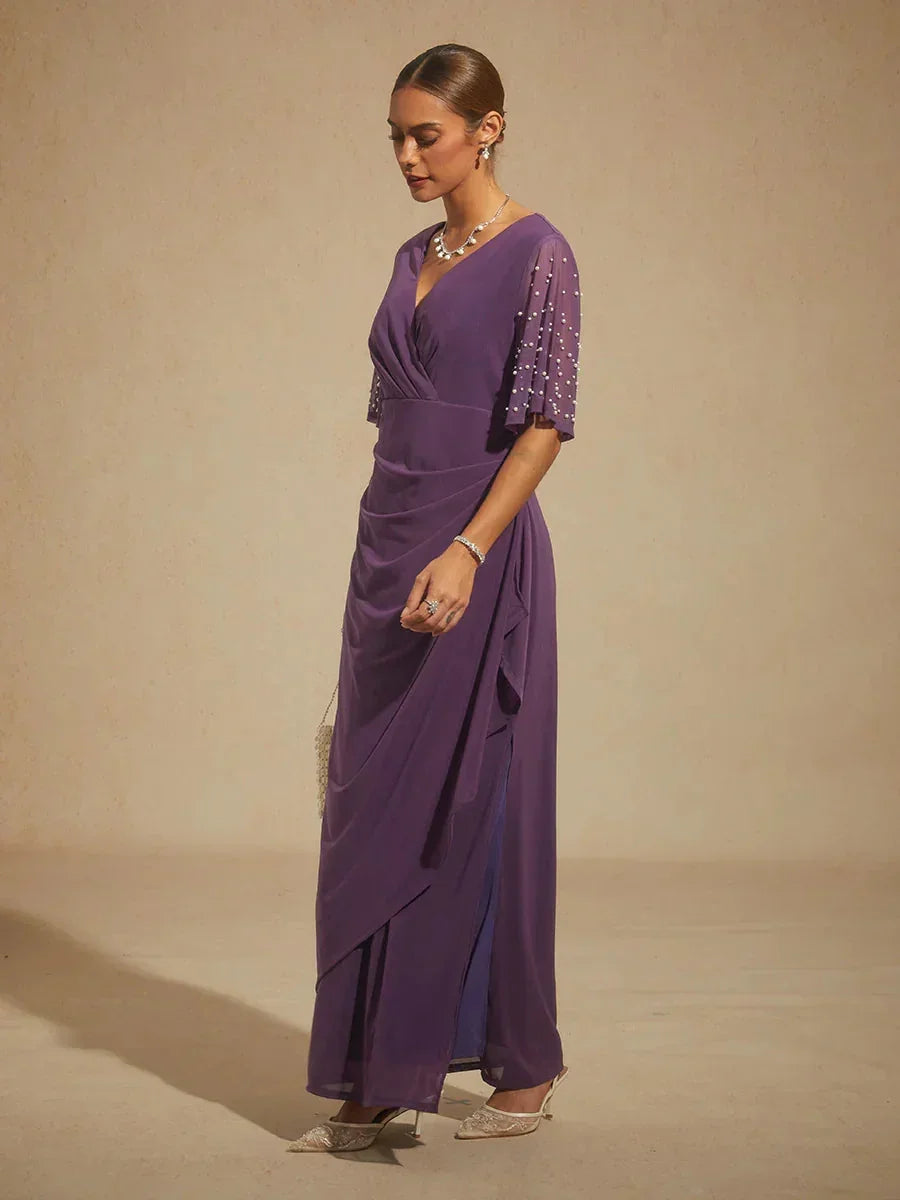 Elegante Formele Galajurk met Versierde Fladdermouwen