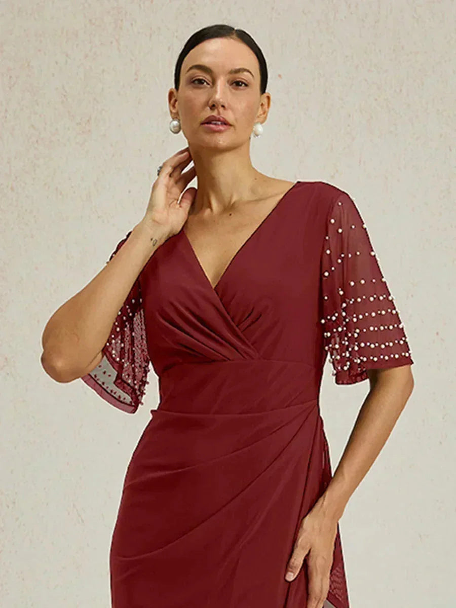 Elegante Galajurk met Versierde Fladdermouwen