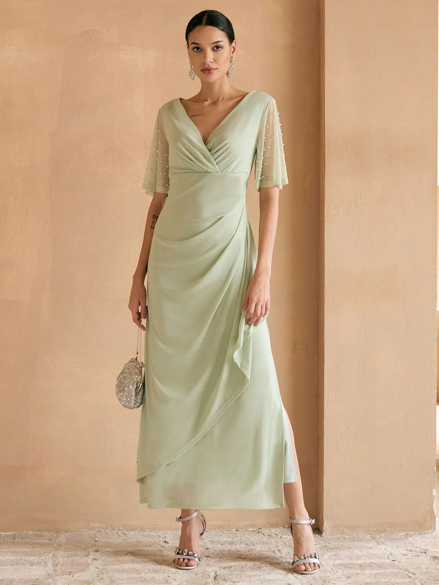 Elegante Galajurk Met Versierde Fladdermouwen